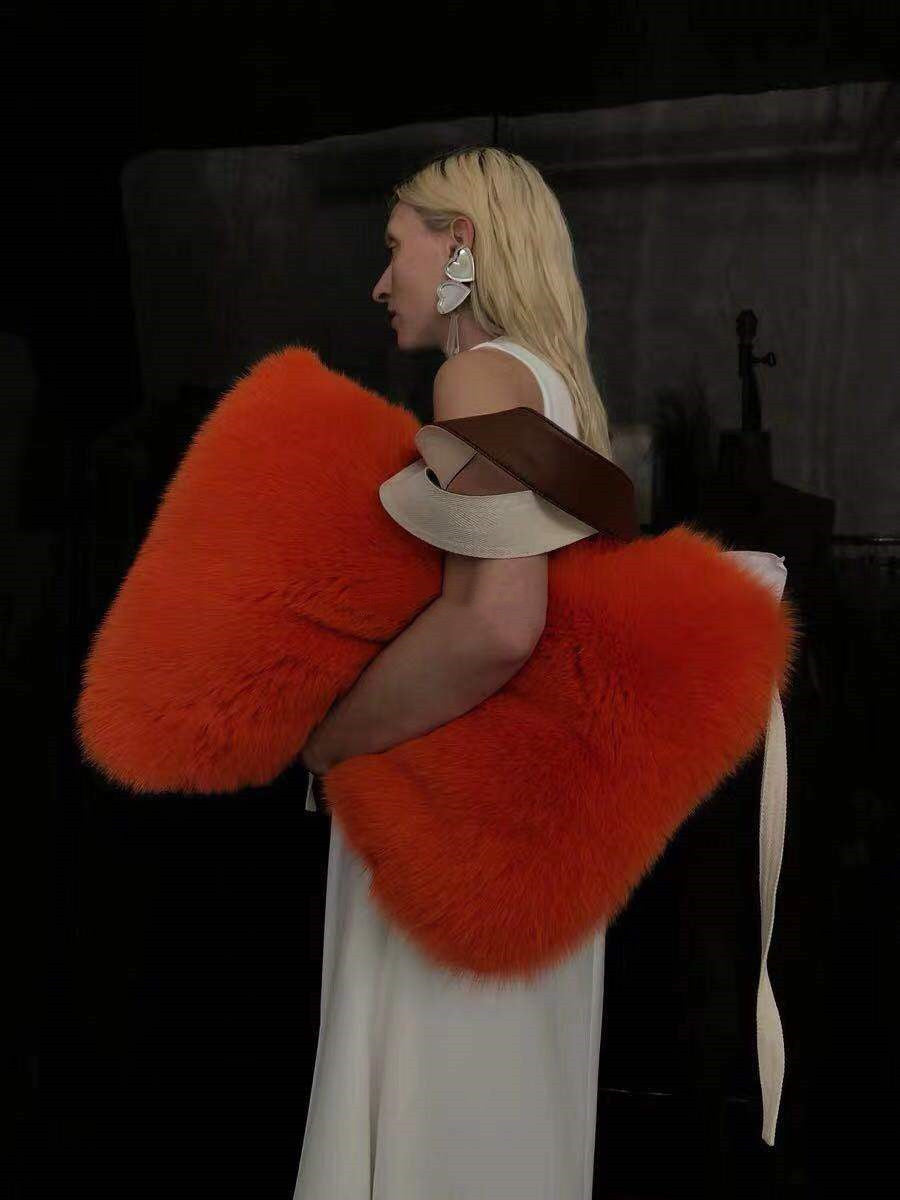 Women's plush fur shoulder bag by CJ featuring soft, fluffy texture and stylish design perfect for fashionable accessories.