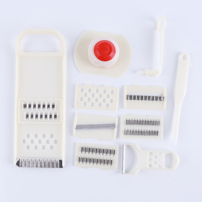 CJ household multi-function vegetable chopper 11-piece set with ginger and garlic smashing device for easy food prep.
