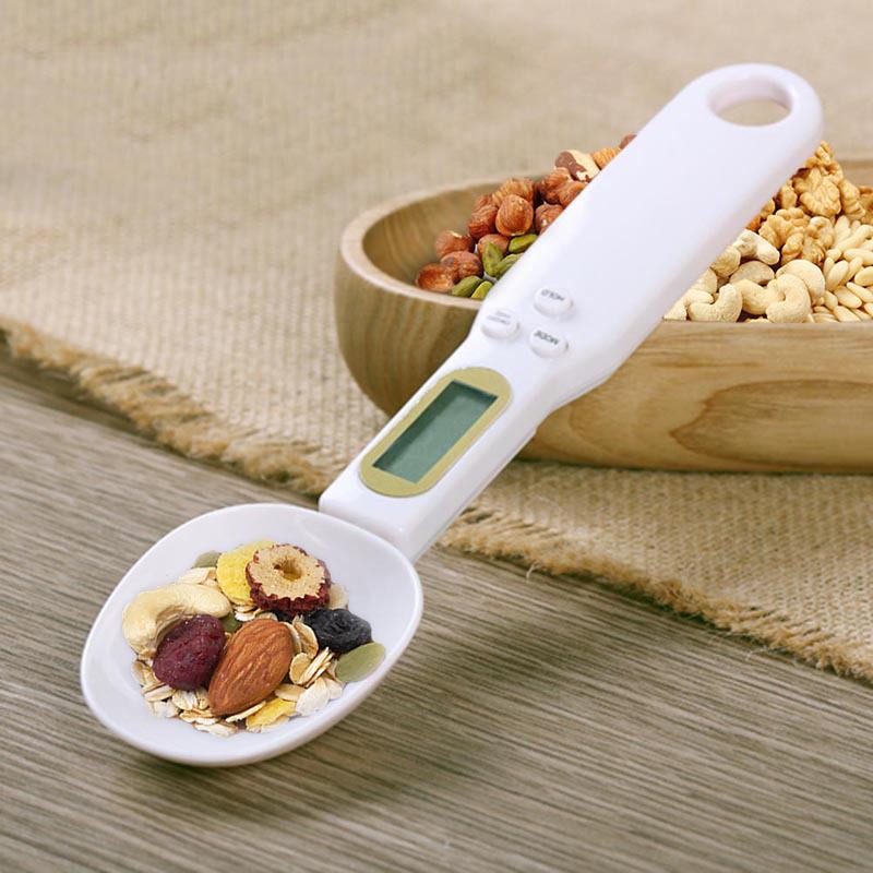 CJ LCD digital kitchen scale displaying food weight measurement with a spoon for coffee, tea, sugar, or cooking ingredients.