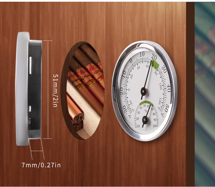 Indoor dry and wet household mini thermometer by CJ showing temperature readings in a compact design