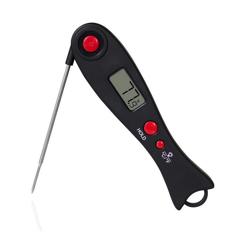 Digital backlight food and grill thermometer by CJ, showing a close-up of the precision kitchen probe in use.