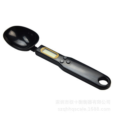 CJ LCD digital kitchen scale with measuring spoon for precise grams, ideal for cooking, coffee, tea, sugar, and food weighing.