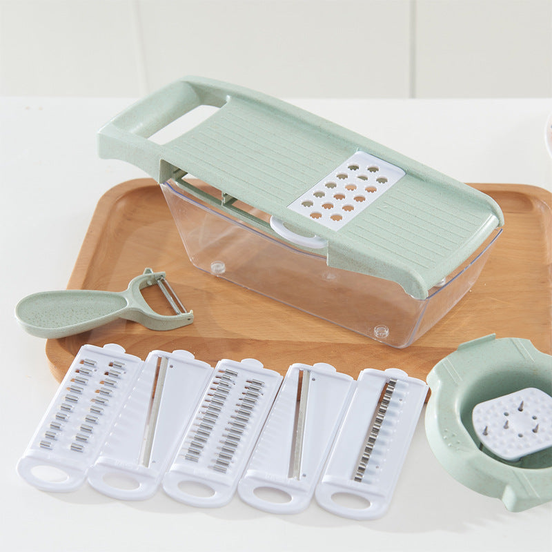 CJ multi-function chopper with stainless steel blades and transparent container for easy food preparation in the kitchen.