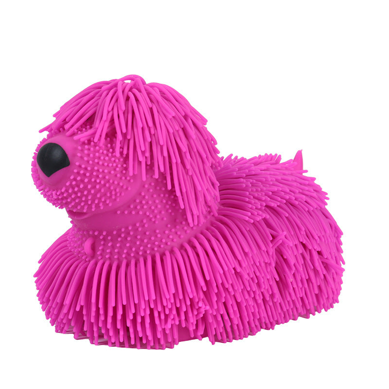CJ dog squeezing toy with decompression ball, soft rubber pet toy for chewing and play, shown in close-up with textured surface.