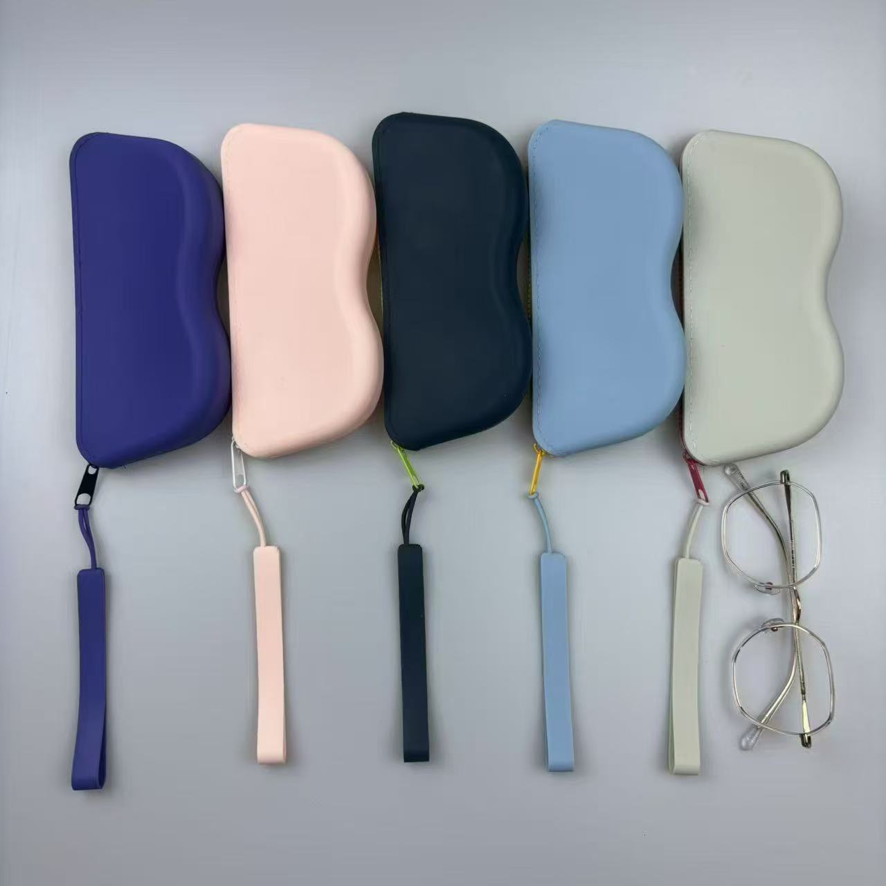 CJ mirror storage bag with silicone sunglasses holder, compact hanging storage box for organizing eyewear and small accessories.
