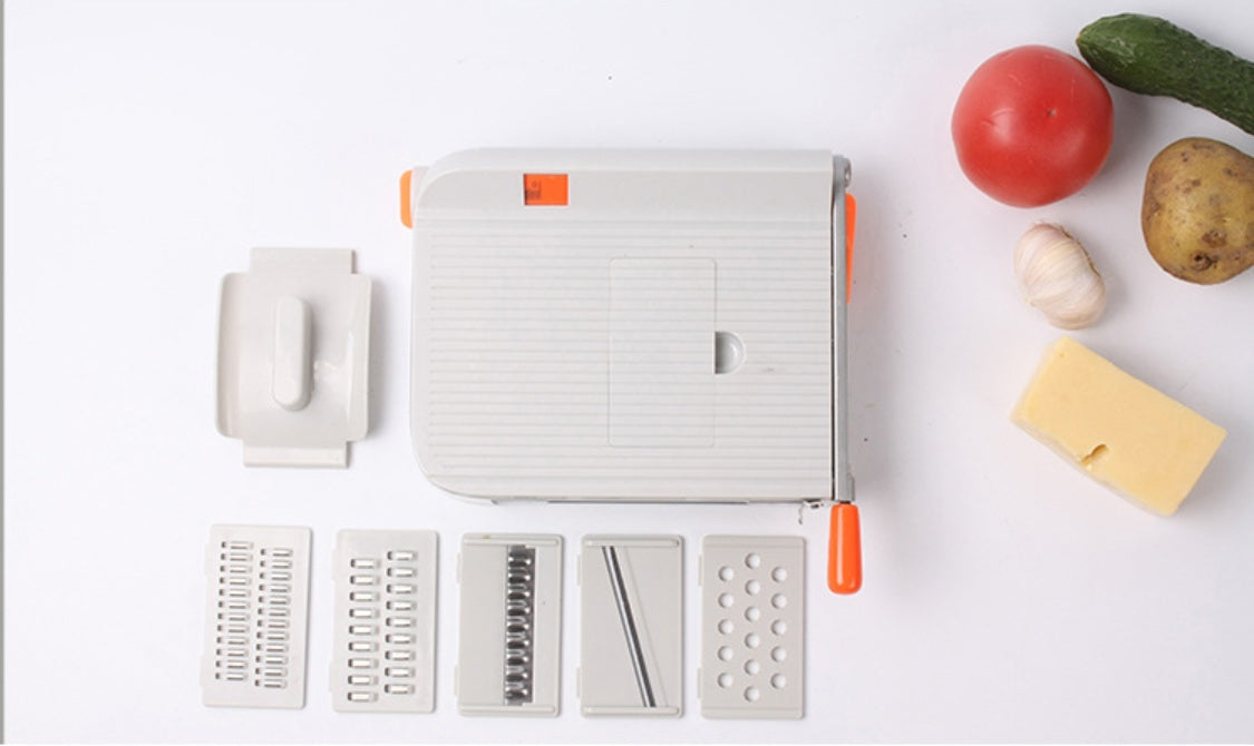 CJ kitchenware multi-function vegetable cutter with stainless steel blades and ergonomic handle for easy vegetable slicing and dicing.