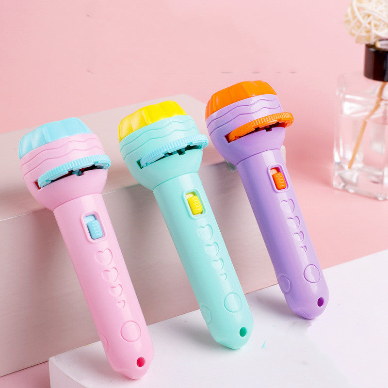 Children's projection flashlight toy by CJ featuring educational literacy figures for early learning and interactive play.