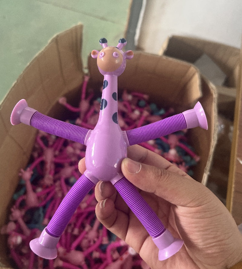 CJ Giraffe Tubes sensory fidget toy with colorful stretch tubes, designed for stress relief and kids' birthday party favors.