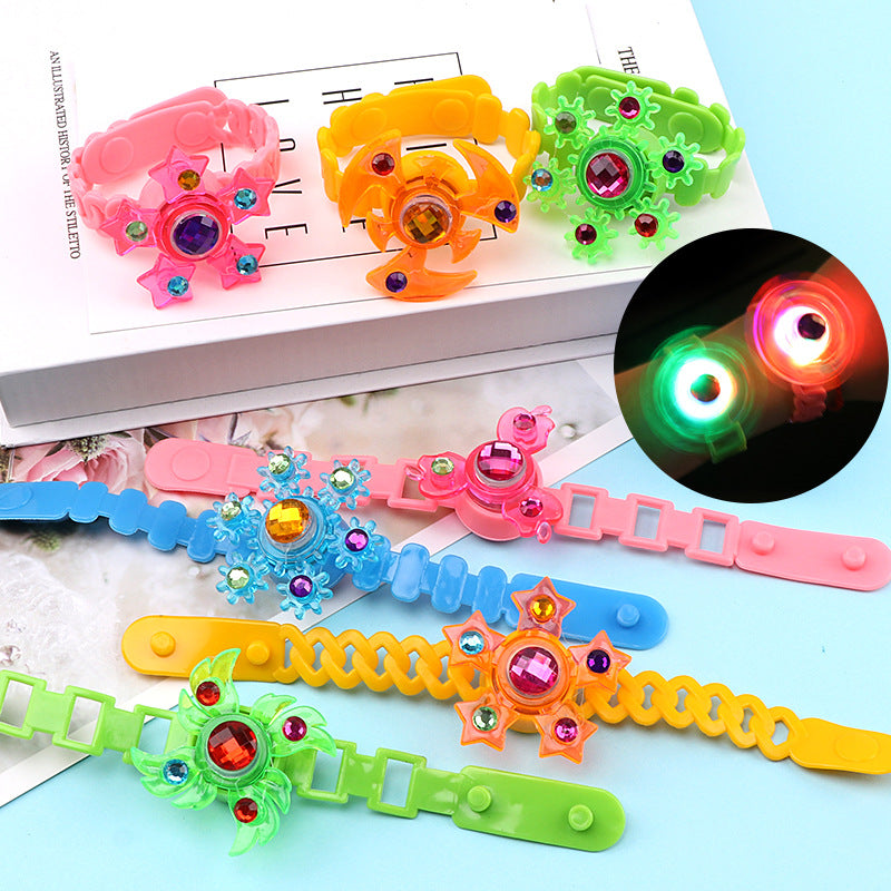 CJ luminous LED fidget spinner with glowing lights, designed for stress relief and sensory play, featuring a bracelet and dark glow effect.