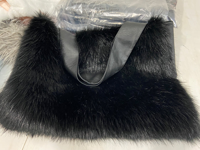 CJ women's plush shoulder bag with soft fur exterior, stylish and cozy accessory for casual or evening wear.